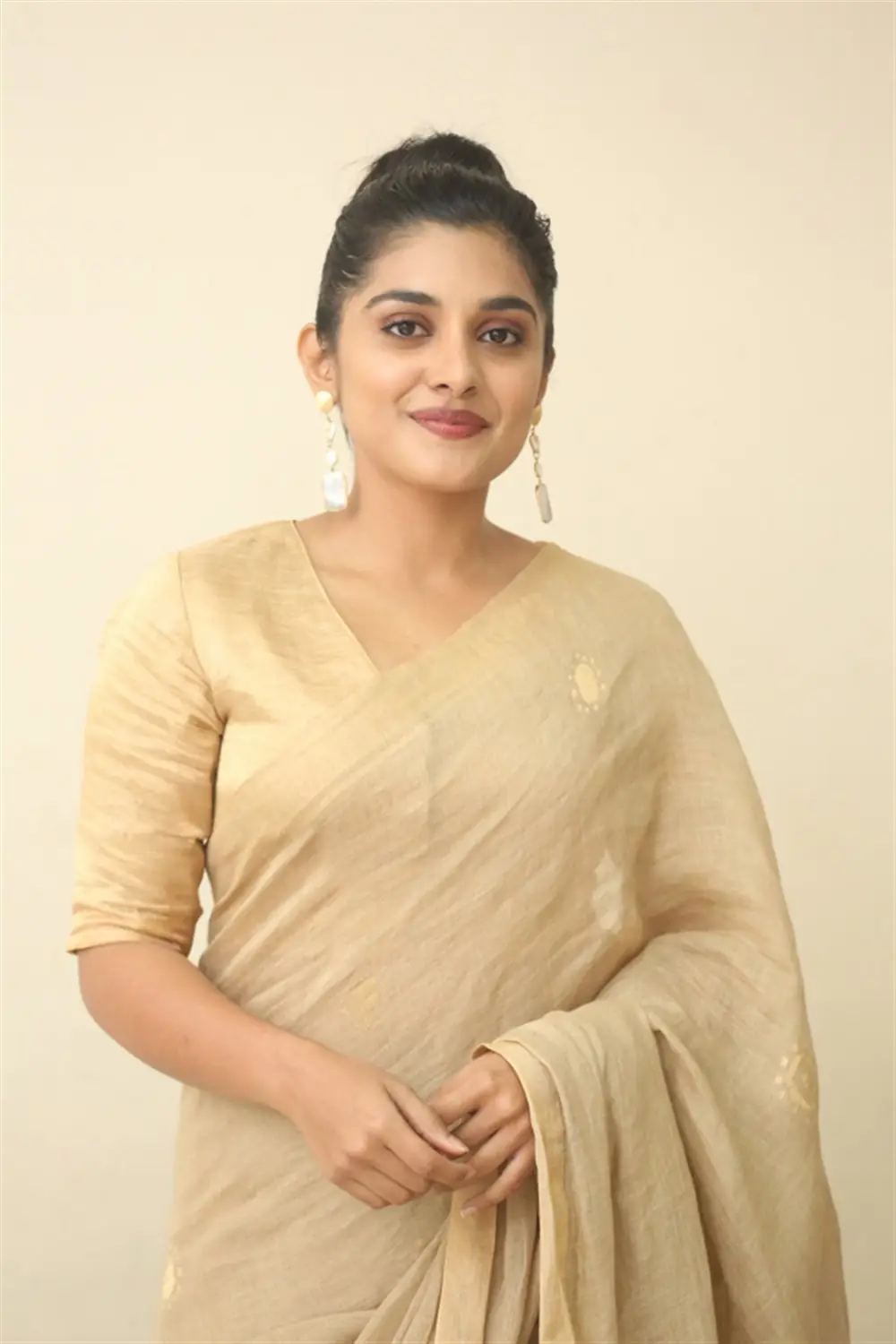 NIVETHA THOMAS CHARMING IN YELLOW SAREE BLOUSE